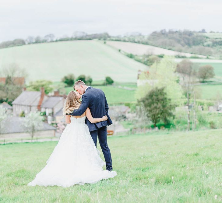 Bride in Warren Watters Gown | Groom in Marks and Spencer Suit | Peach & White Wedding at Upwaltham Barns | White Stag Wedding Photography