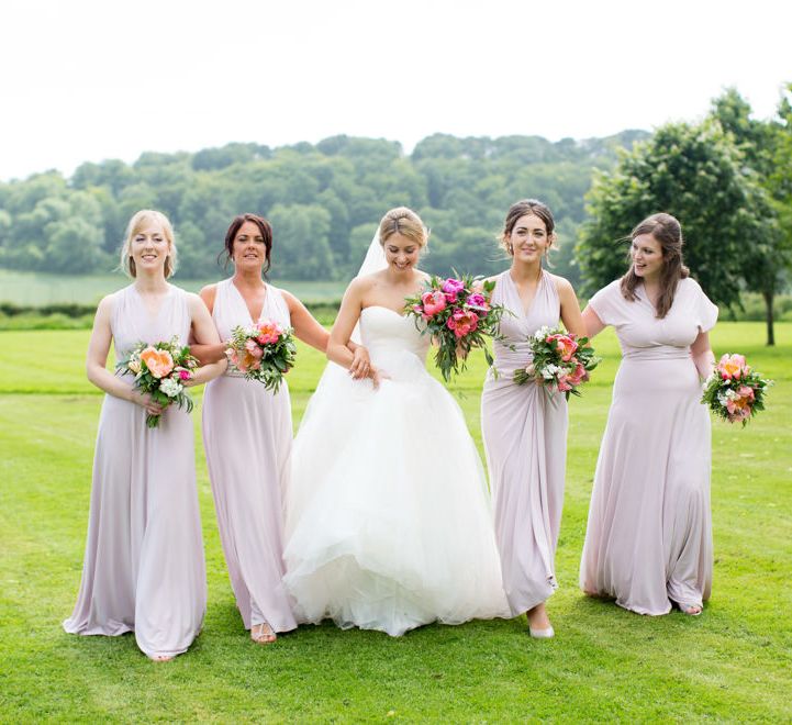 Pronovias Bride For Classic Wedding At The Tithe Barn With Bridesmaids In Coast Multiway Dresses & Images From Helen Cawte Photography