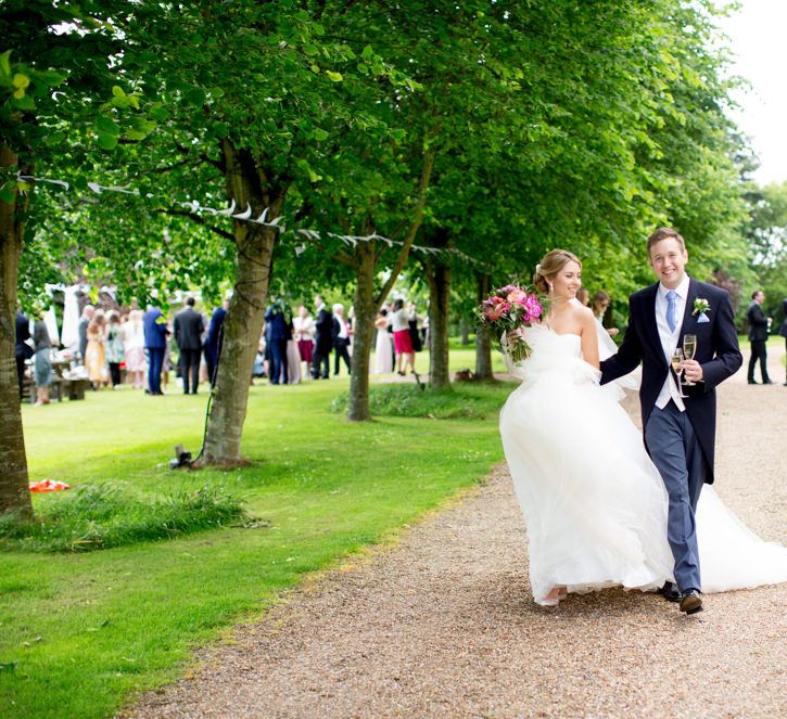 Pronovias Bride For Classic Wedding At The Tithe Barn With Bridesmaids In Coast Multiway Dresses & Images From Helen Cawte Photography