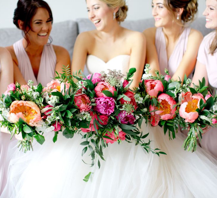 Wedding Bouquet With Peonies // Pronovias Bride For Classic Wedding At The Tithe Barn With Bridesmaids In Coast Multiway Dresses & Images From Helen Cawte Photography