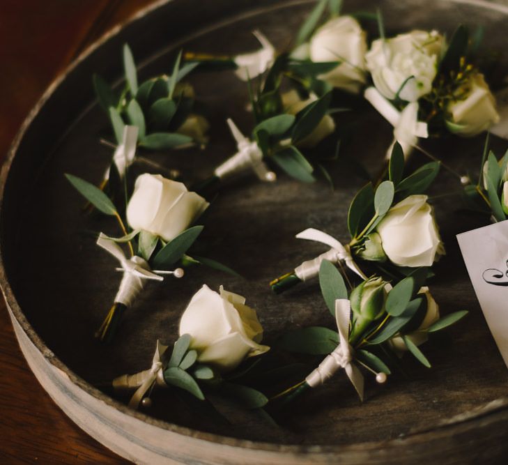 White Rose Buttonholes // Elegant Wedding Brympton House Somerset With Bride Wearing Inbal Dror And Groom In Black Tux By Alexander McQueen With Images From Modern Vintage Weddings