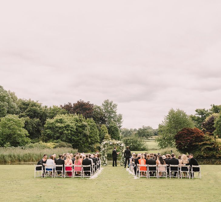 Outdoor Wedding Ceremony // Elegant Wedding Brympton House Somerset With Bride Wearing Inbal Dror And Groom In Black Tux By Alexander McQueen With Images From Modern Vintage Weddings