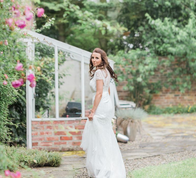 Bride in Rachele Bride in Ronald Joyce Wedding Dress