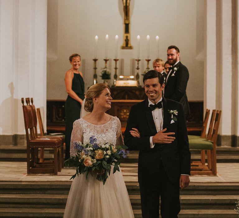 Church Wedding Ceremony | Bride in Willowby Watters 'Amelia' Gown | Groom in Hugo Boss Tuxedo | Rustic Barn Wedding in Norway | Christin Eide Photography