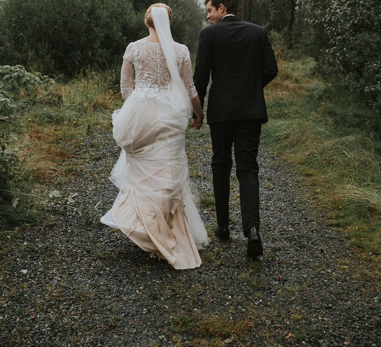 Bride in Willowby Watters 'Amelia' Gown | Groom in Hugo Boss Tuxedo | Rustic Barn Wedding in Norway | Christin Eide Photography