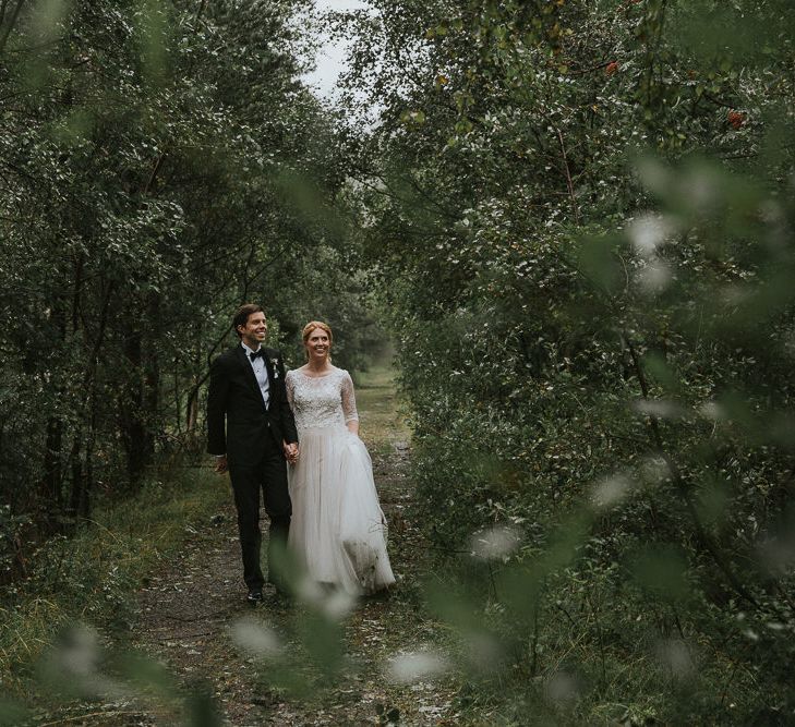 Bride in Willowby Watters 'Amelia' Gown | Groom in Hugo Boss Tuxedo | Rustic Barn Wedding in Norway | Christin Eide Photography