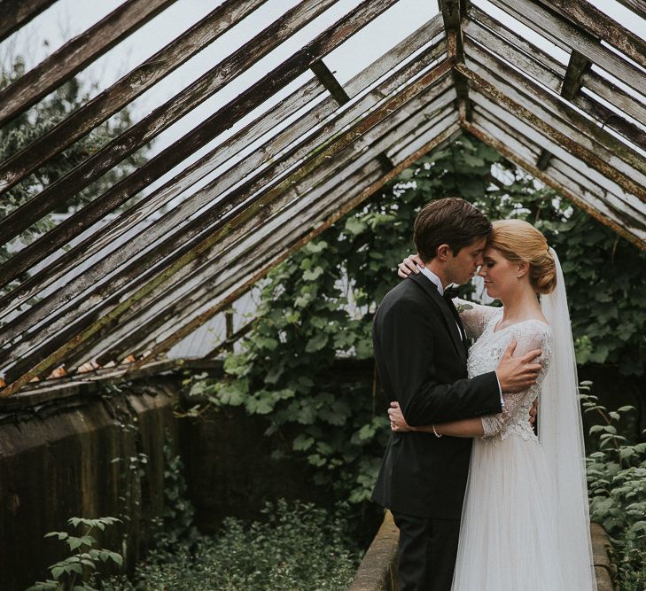 Bride in Willowby Watters 'Amelia' Gown | Groom in Hugo Boss Tuxedo | Rustic Barn Wedding in Norway | Christin Eide Photography