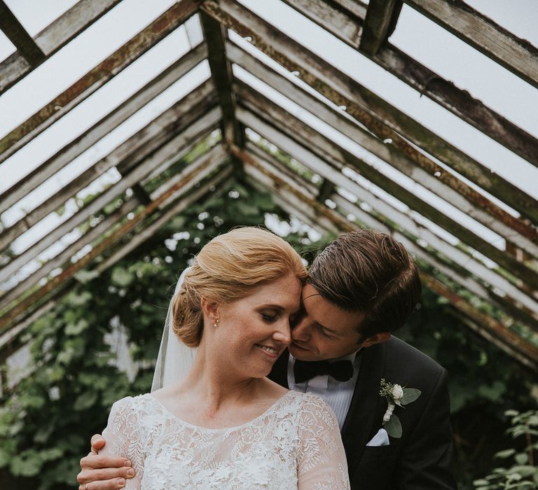 Bride in Willowby Watters 'Amelia' Gown | Groom in Hugo Boss Tuxedo | Rustic Barn Wedding in Norway | Christin Eide Photography