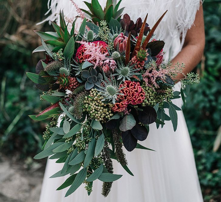 Wedding Bouquet In Rich Berry Tones With Lots Of Foliage