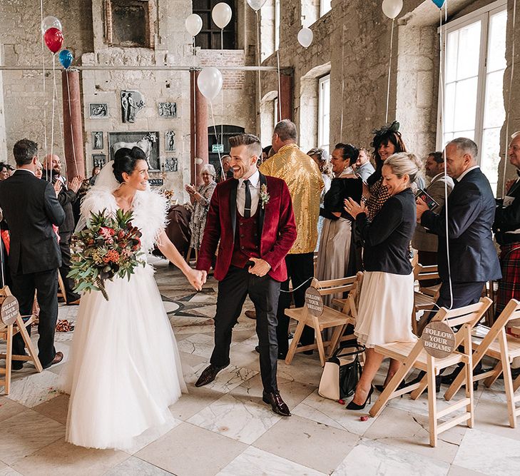 Bride In Feather Wedding Dress