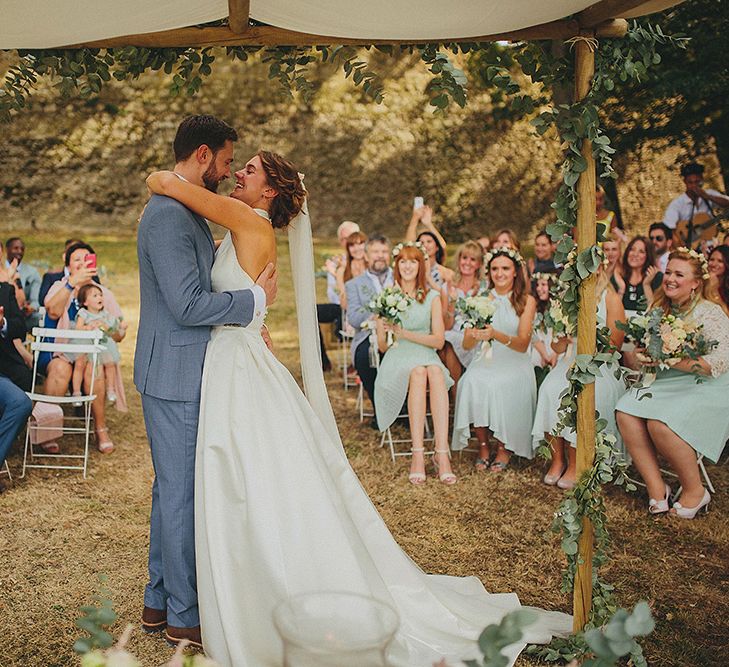 Bride in Jesús Peiró 3000 Dress from Morgan Davies Bridal | Groom in New & Lingwood Three Piece Suit | Petar Jurica Photography