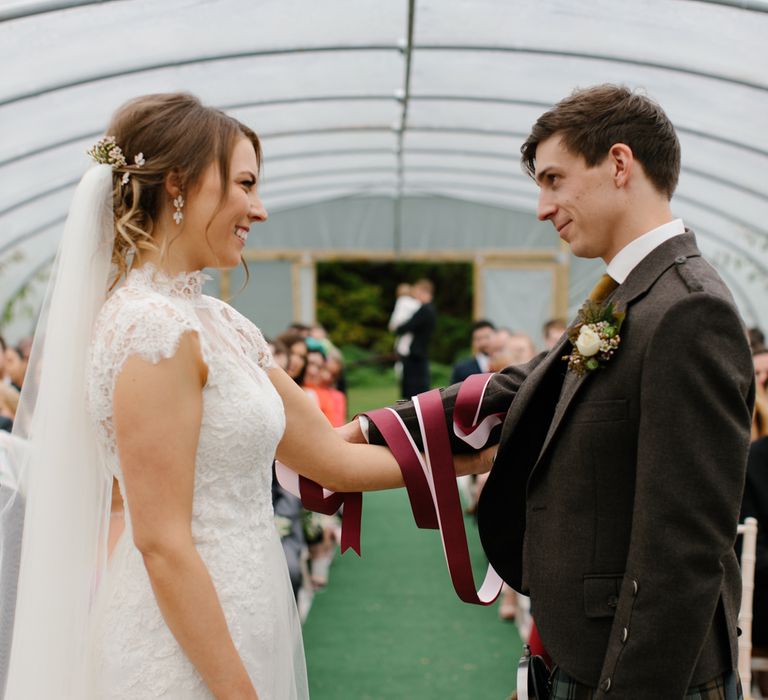 Foliage Filled Wedding At Colstoun East Lothian With Polytunnel Ceremony And Bridesmaids In Dusky Pink & Images From Caro Weiss Photography