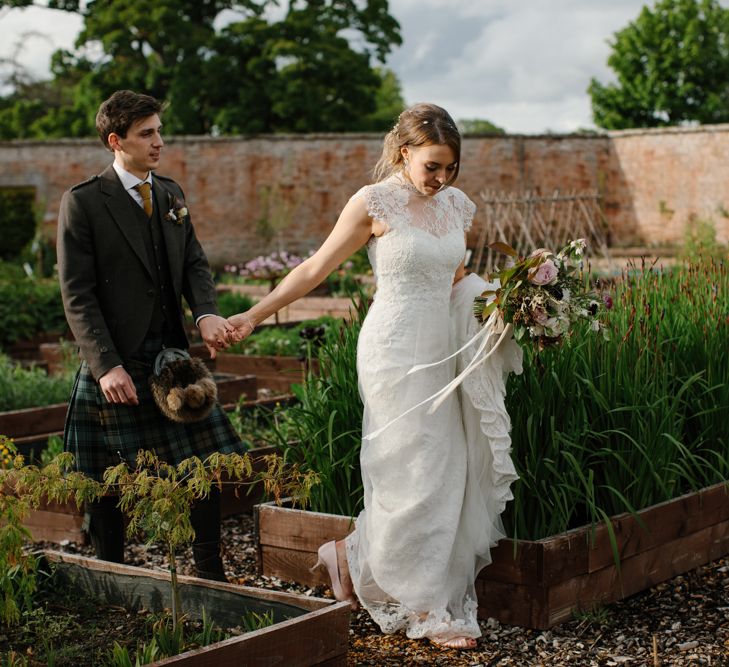 Foliage Filled Wedding At Colstoun East Lothian With Polytunnel Ceremony And Bridesmaids In Dusky Pink & Images From Caro Weiss Photography