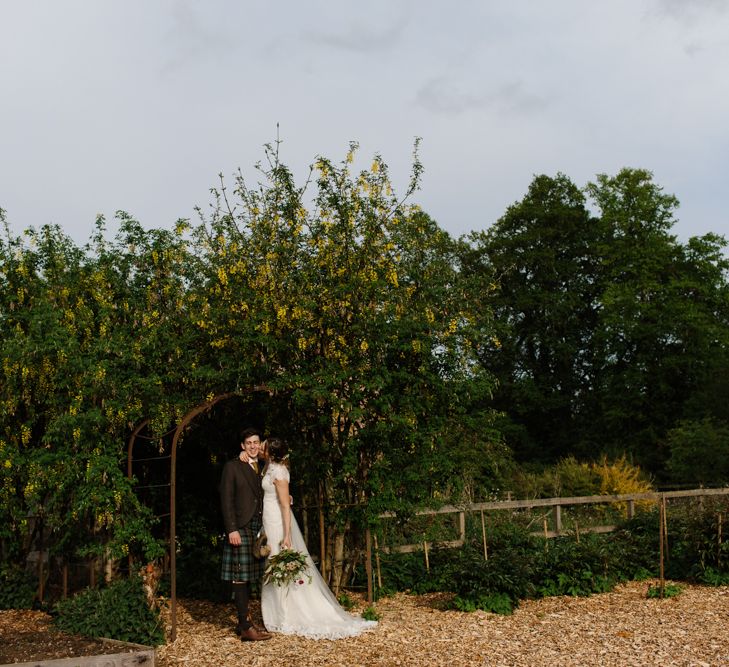 Foliage Filled Wedding At Colstoun East Lothian With Polytunnel Ceremony And Bridesmaids In Dusky Pink & Images From Caro Weiss Photography