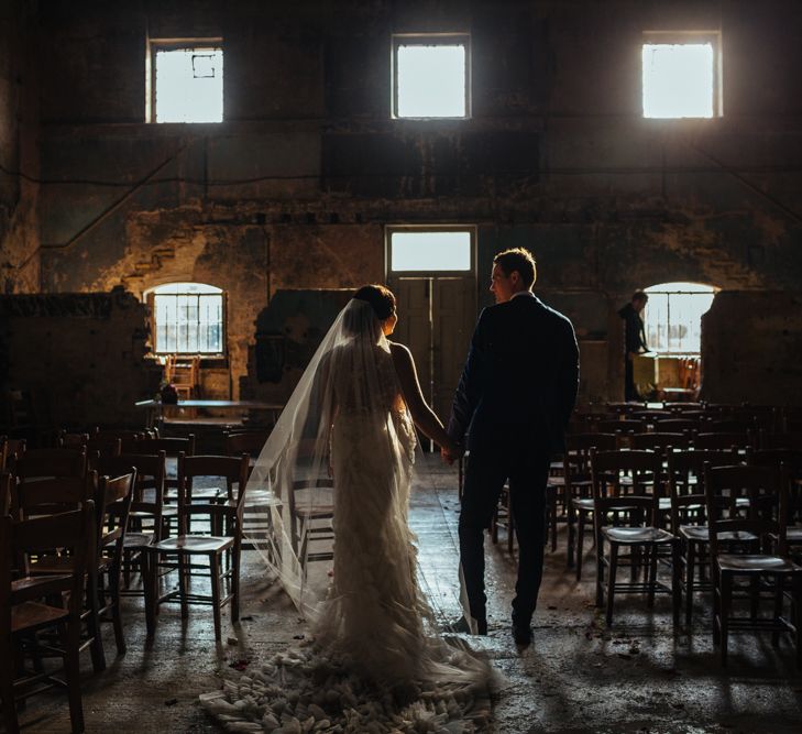 The Asylum | Bride in Lazaro Gown | Groom in Navy Ted Baker Suit | Helen Abraham Photography