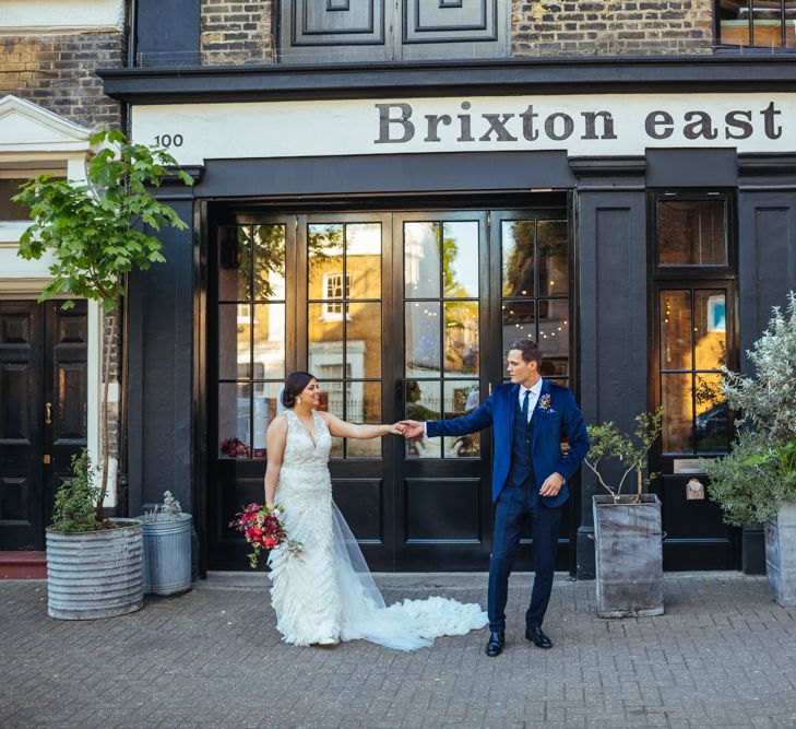 Brixton East | Bride in Lazaro Gown | Groom in Navy Ted Baker Suit | Helen Abraham Photography