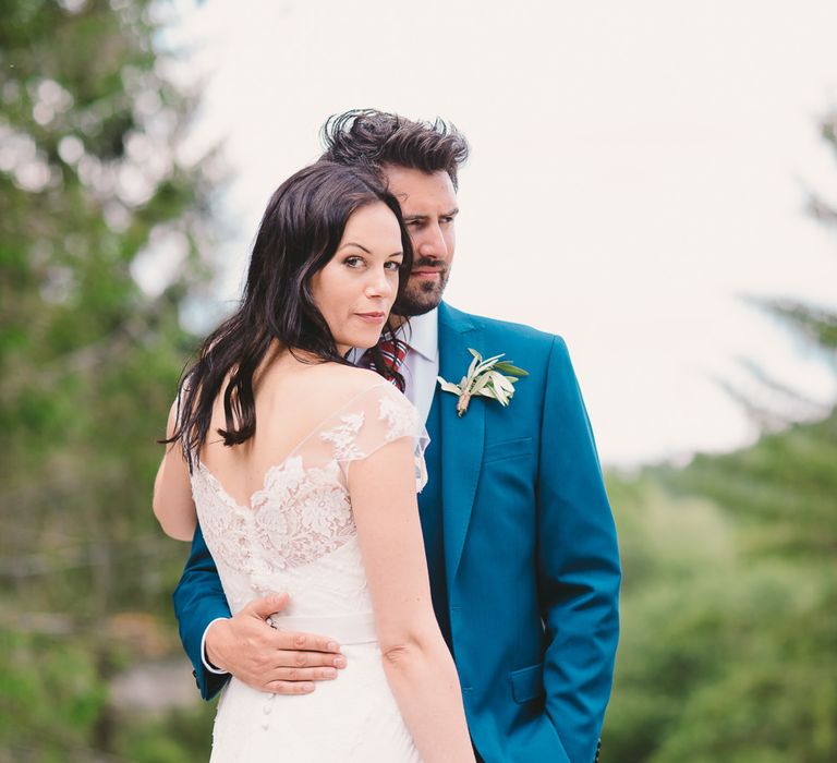 Bride in Naomi Neoh Gown & Groom in French Connection Suit