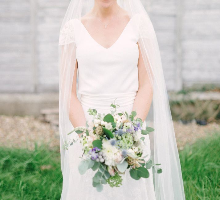 Bride in Charlie Brear Peyton Dress & Augustine Skirt