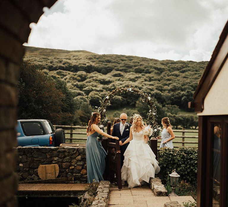 Bridal Entrance in Layered Wedding Dress | Outdoor Festival Beach Wedding at Aberdovey in Wales | Katie Ingram Photography