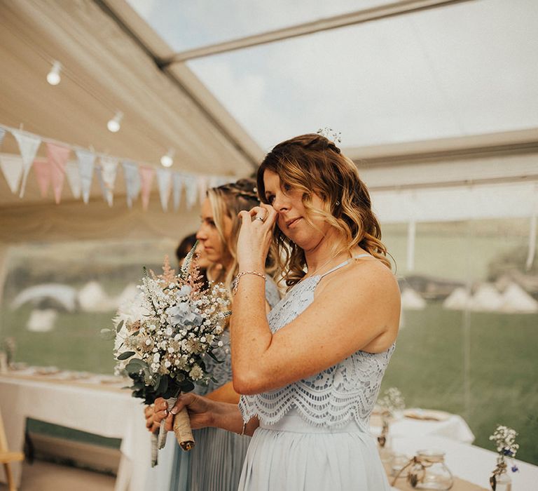 Bridesmaid in Blue Gown | Outdoor Festival Beach Wedding at Aberdovey in Wales | Katie Ingram Photography