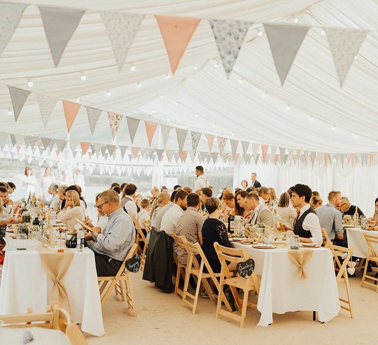 Bunting | Wedding Reception | Outdoor Festival Beach Wedding at Aberdovey in Wales | Katie Ingram Photography