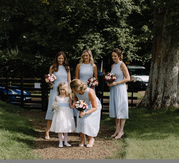 Bridesmaids in Blue Dresses | Rural Wedding in a Sailcloth Tent on Stanford Hall Estate, Northamptonshire | Rebecca Goddard Photography