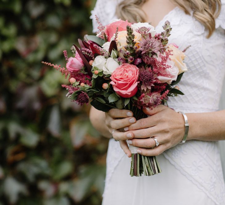 Coral Wedding Bouquet | Bride in a Temperley Cressida Gown | Rural Wedding in a Sailcloth Tent on Stanford Hall Estate, Northamptonshire | Rebecca Goddard Photography