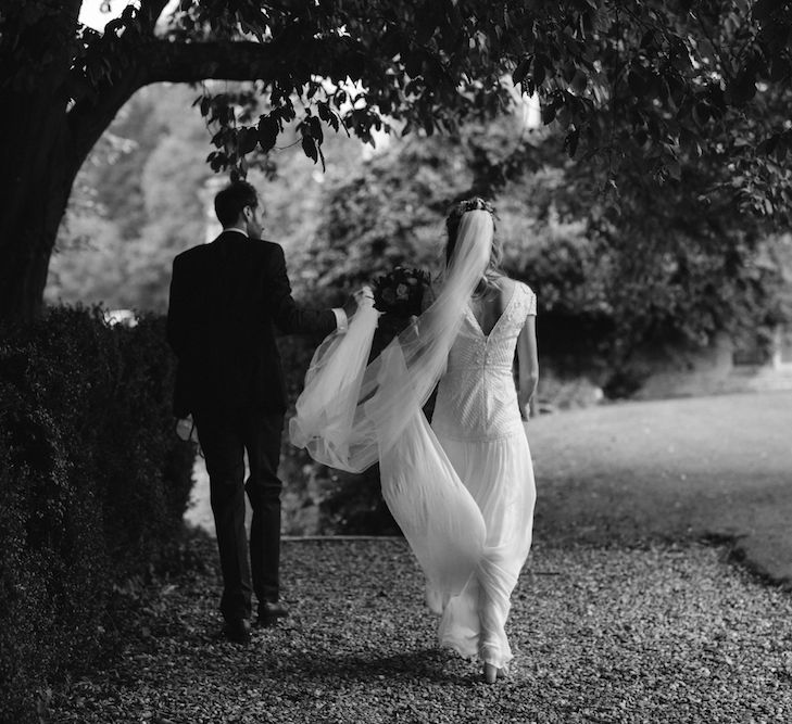 Bride in a Temperley Cressida Gown | Groom in Sandro Suit | Rural Wedding in a Sailcloth Tent on Stanford Hall Estate, Northamptonshire | Rebecca Goddard Photography