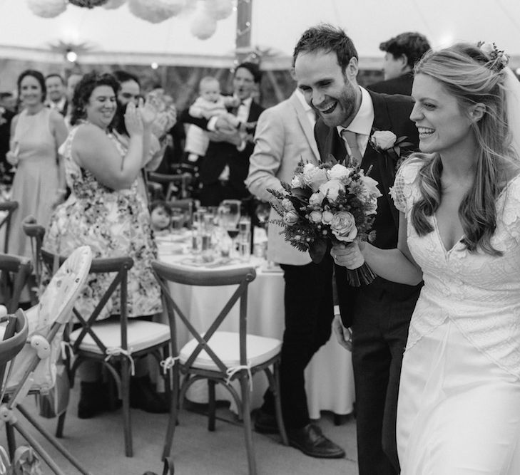 Bride in a Temperley Cressida Gown | Groom in Sandro Suit | Rural Wedding in a Sailcloth Tent on Stanford Hall Estate, Northamptonshire | Rebecca Goddard Photography