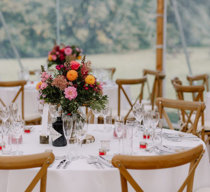 Floral Centrepiece | Rural Wedding in a Sailcloth Tent on Stanford Hall Estate, Northamptonshire | Rebecca Goddard Photography