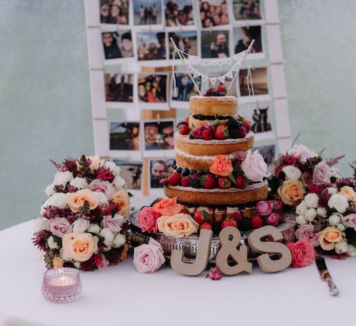 Naked Sponge Wedding Cake | Rural Wedding in a Sailcloth Tent on Stanford Hall Estate, Northamptonshire | Rebecca Goddard Photography