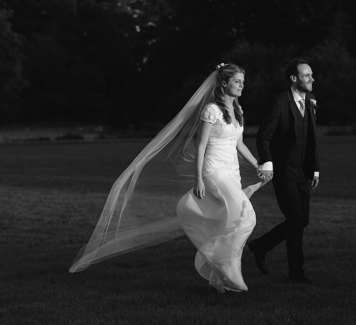 Bride in a Temperley Cressida Gown | Groom in Sandro Suit | Rural Wedding in a Sailcloth Tent on Stanford Hall Estate, Northamptonshire | Rebecca Goddard Photography