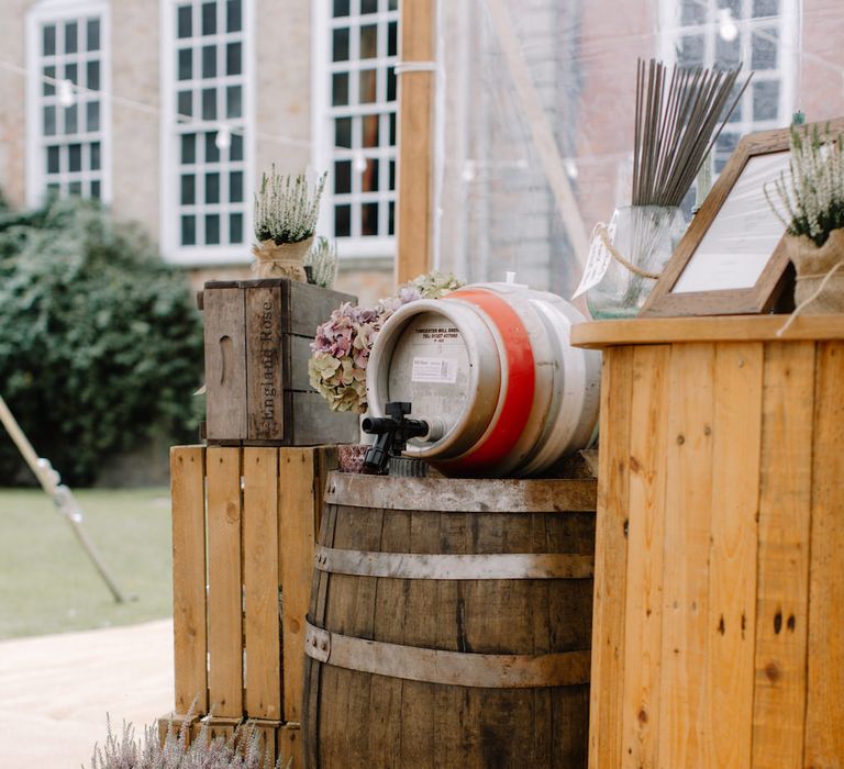 Wooden Beer Barrel | Rural Wedding in a Sailcloth Tent on Stanford Hall Estate, Northamptonshire | Rebecca Goddard Photography