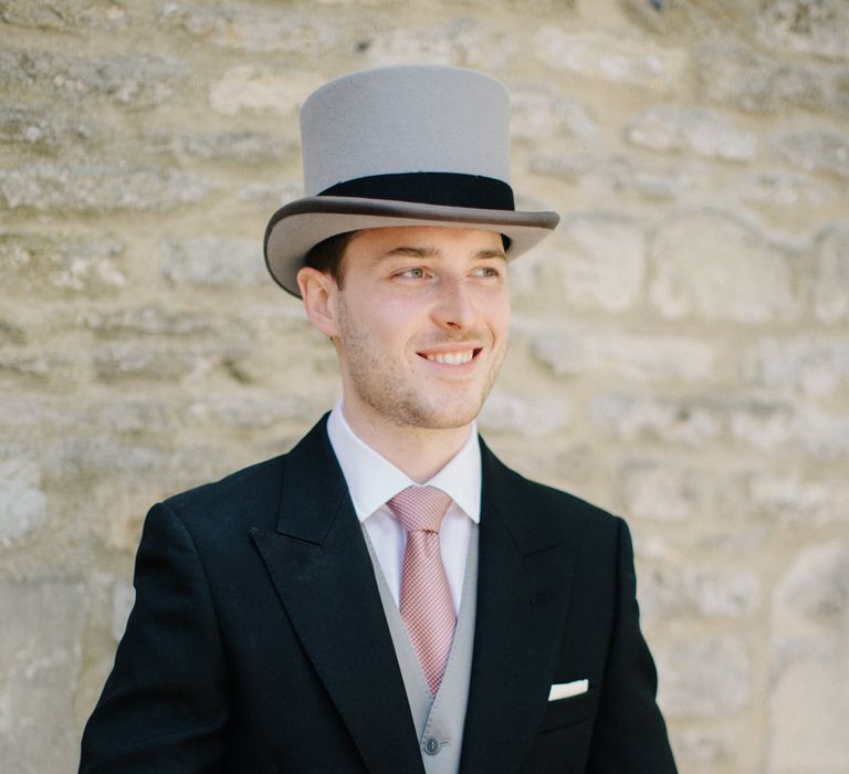 Groom on Top Hat & Tails Morning Suit | Outdoor Pastel Country Garden Wedding at Barnsley House in Cirencester | M and J Photography | Motion Farm Wedding Films