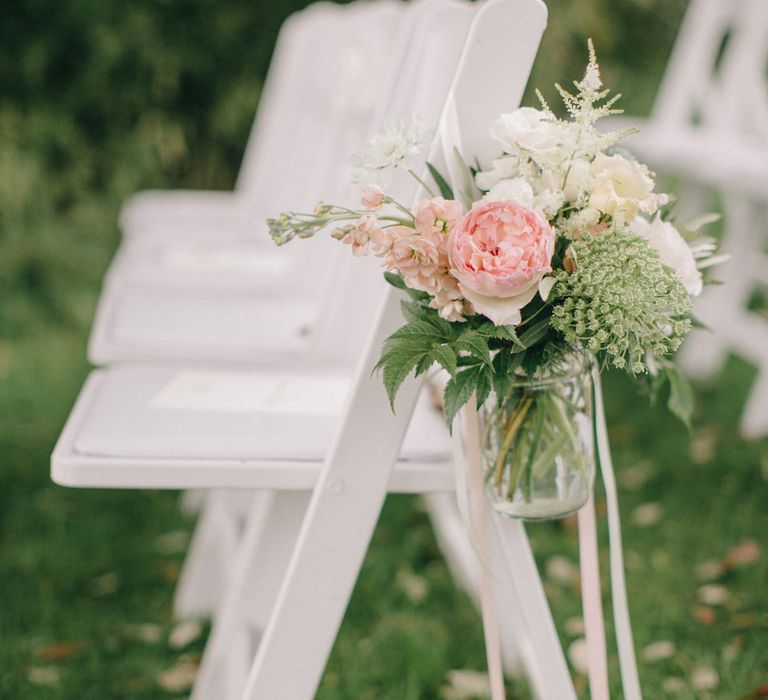 Aisle Chair Wedding Flowers | Outdoor Pastel Country Garden Wedding at Barnsley House in Cirencester | M and J Photography | Motion Farm Wedding Films