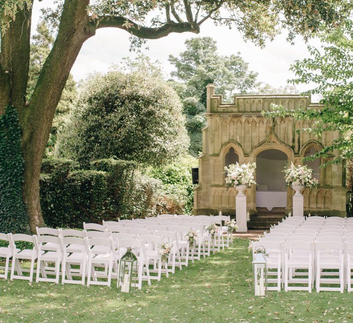 Outdoor Ceremony Pastel Country Garden Wedding at Barnsley House in Cirencester | M and J Photography | Motion Farm Wedding Films