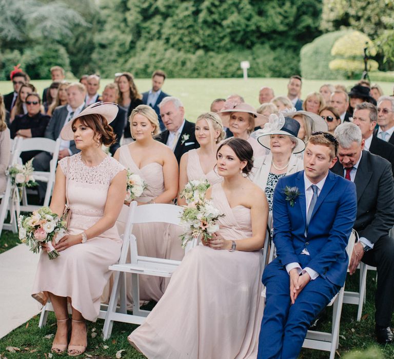 Wedding Guests | Outdoor Pastel Country Garden Wedding at Barnsley House in Cirencester | M and J Photography | Motion Farm Wedding Films