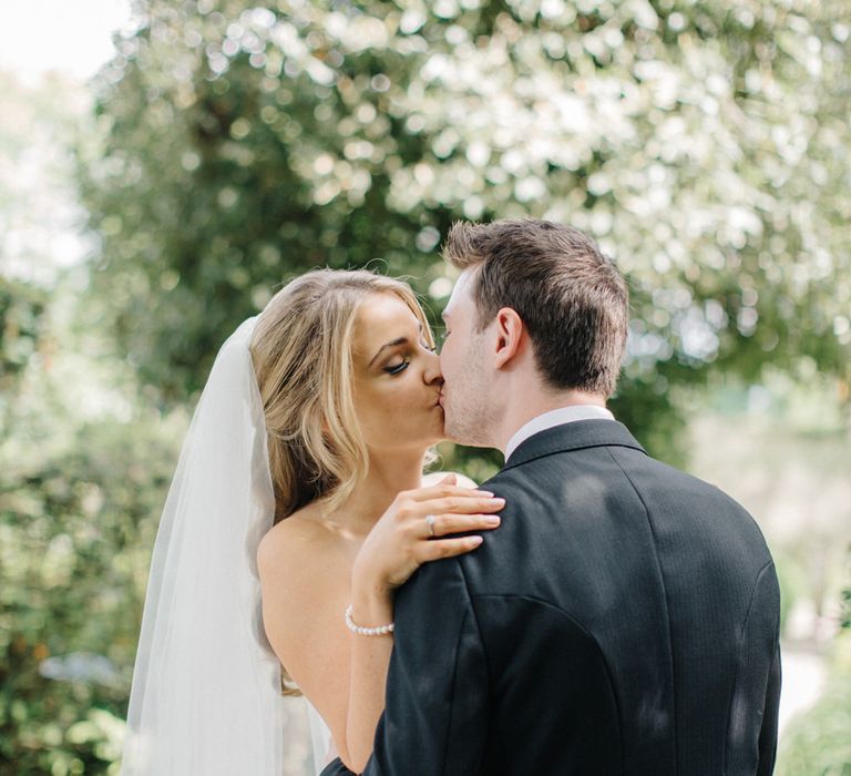 Wedding Ceremony | Bridein Princess Gown | Groom in Top Hat & Tails | Outdoor Pastel Country Garden Wedding at Barnsley House in Cirencester | M and J Photography | Motion Farm Wedding Films