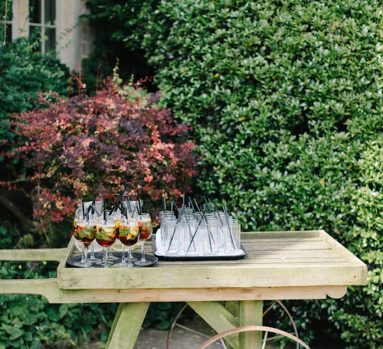 Drinks Station | Outdoor Pastel Country Garden Wedding at Barnsley House in Cirencester | M and J Photography | Motion Farm Wedding Films