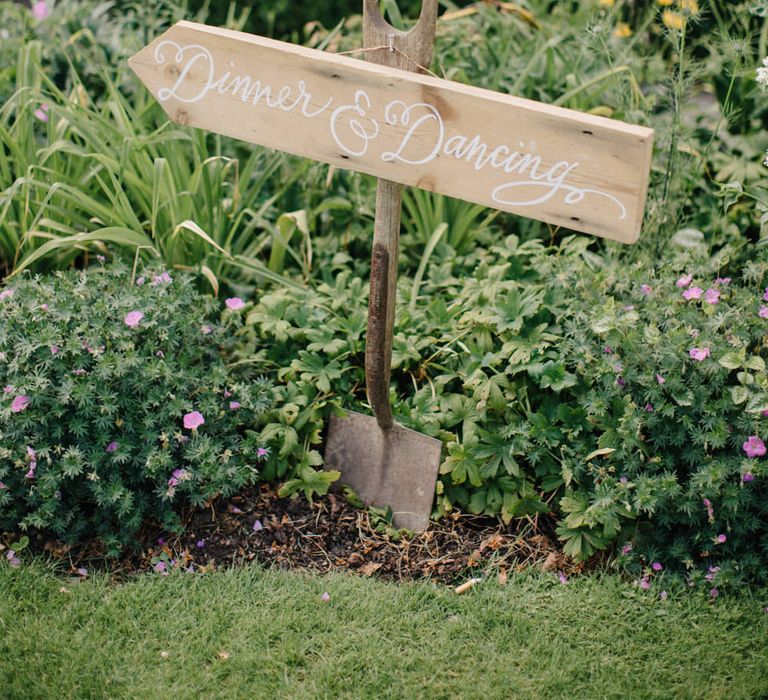 Wooden Wedding Direction Sign | Outdoor Pastel Country Garden Wedding at Barnsley House in Cirencester | M and J Photography | Motion Farm Wedding Films