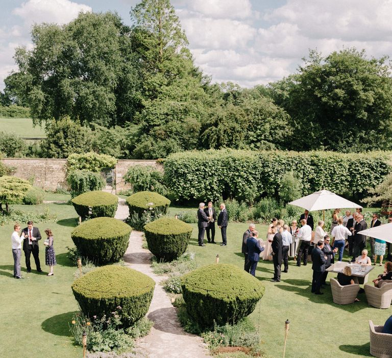 Outdoor Pastel Country Garden Wedding at Barnsley House in Cirencester | M and J Photography | Motion Farm Wedding Films