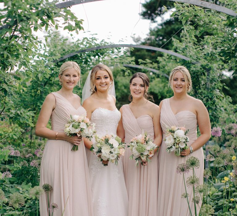 Bridal Party | Bride in Princess Gown | Bridesmaids in Pink Dessy Dresses | Outdoor Pastel Country Garden Wedding at Barnsley House in Cirencester | M and J Photography | Motion Farm Wedding Films