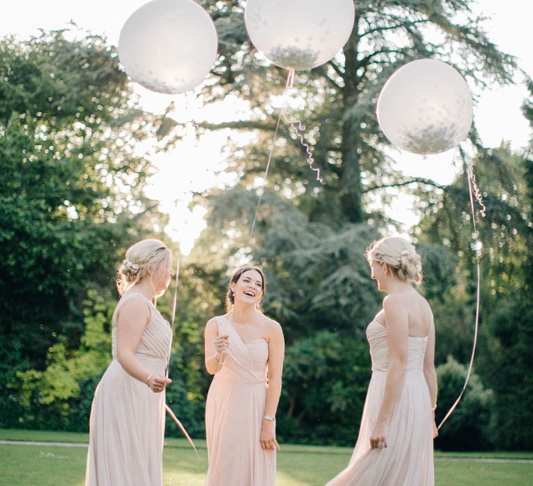 Giant Balloons | Bridesmaids in Blush Dessy Bridesmaid Dresses | Outdoor Pastel Country Garden Wedding at Barnsley House in Cirencester | M and J Photography | Motion Farm Wedding Films