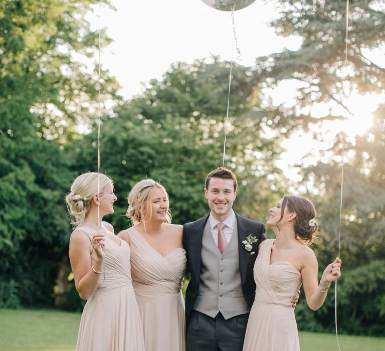 Groom in Traditional Morning Suit | Bridesmaids in Pink Dessy Dresses | Outdoor Pastel Country Garden Wedding at Barnsley House in Cirencester | M and J Photography | Motion Farm Wedding Films