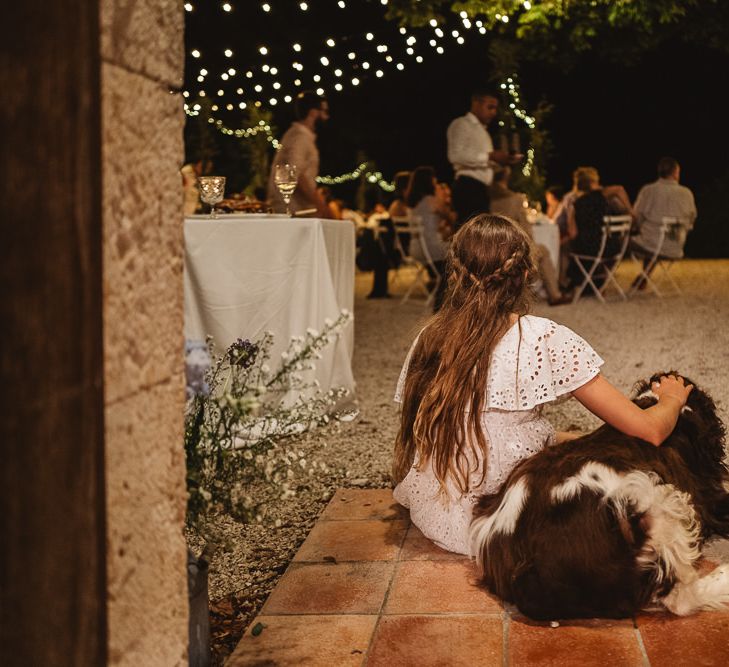 Fairy lit wedding in France at Chateau de Lartigolle. Photography by Derek Smietana