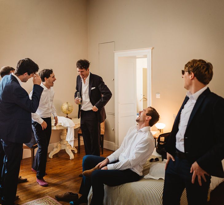 Groom and his men getting ready in South West France at Chateau de Lartigolle