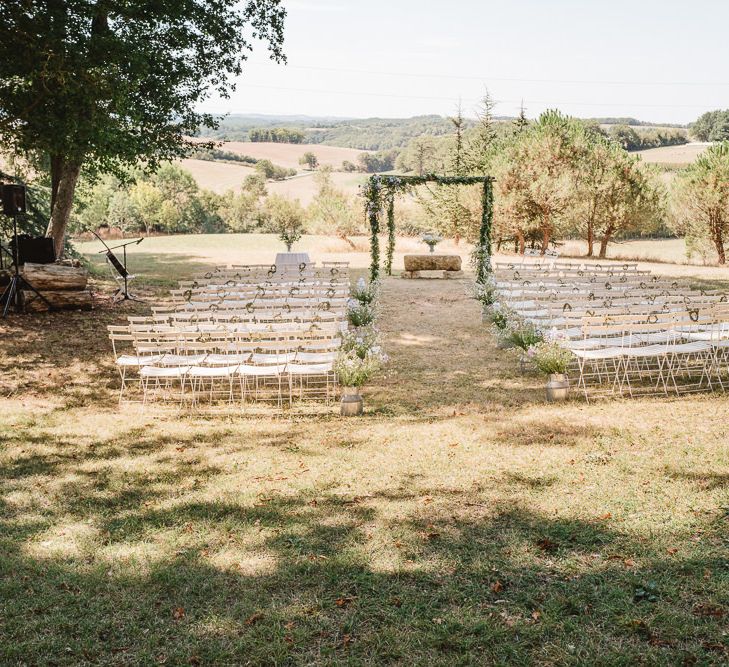 Wedding ceremony inspiration. White chair perfection.