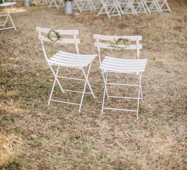 Wedding ceremony inspiration. White chair perfection.