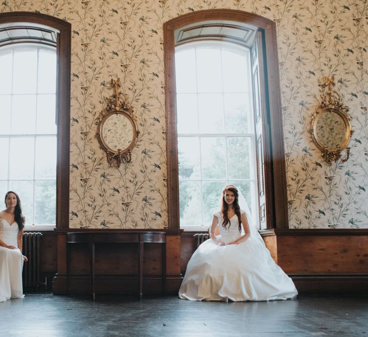 Two Brides in Ocean Bridal Studio Wedding Dress & White Leaf Bridal Wedding Dress