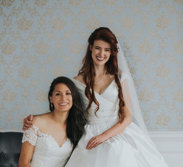 Two Brides in Ocean Bridal Studio Wedding Dress & White Leaf Bridal Wedding Dress